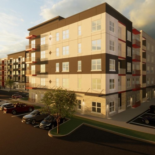 a building with cars parked in front