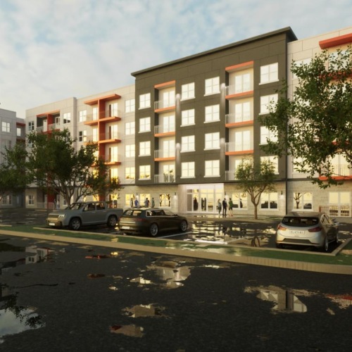 a large building with a parking lot in front of it